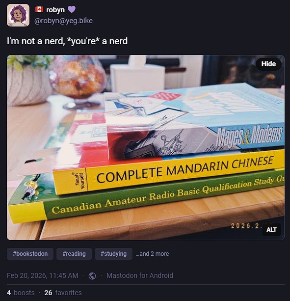 Screenshot of the linked mastodon post, showing a stack of three books. Screenshot of the linked mastodon post, showing a stack of three books.